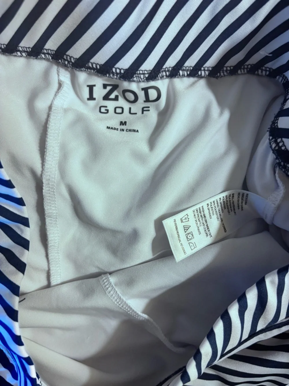 Izod Navy and White Striped Golf Skort with Pleated Flounce - Picture 6 of 6